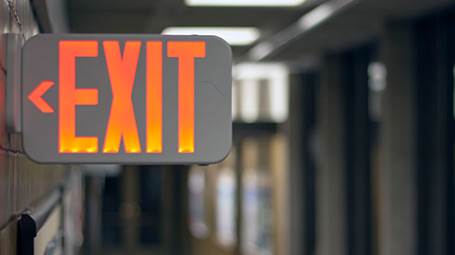 Exit sign above door