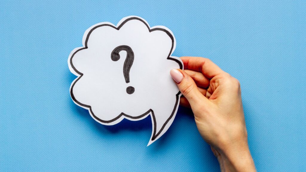 cutout of a thought bubble with a question mark in the middle