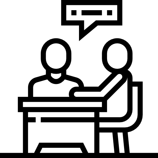 Student sitting at desk with transfer coordinator